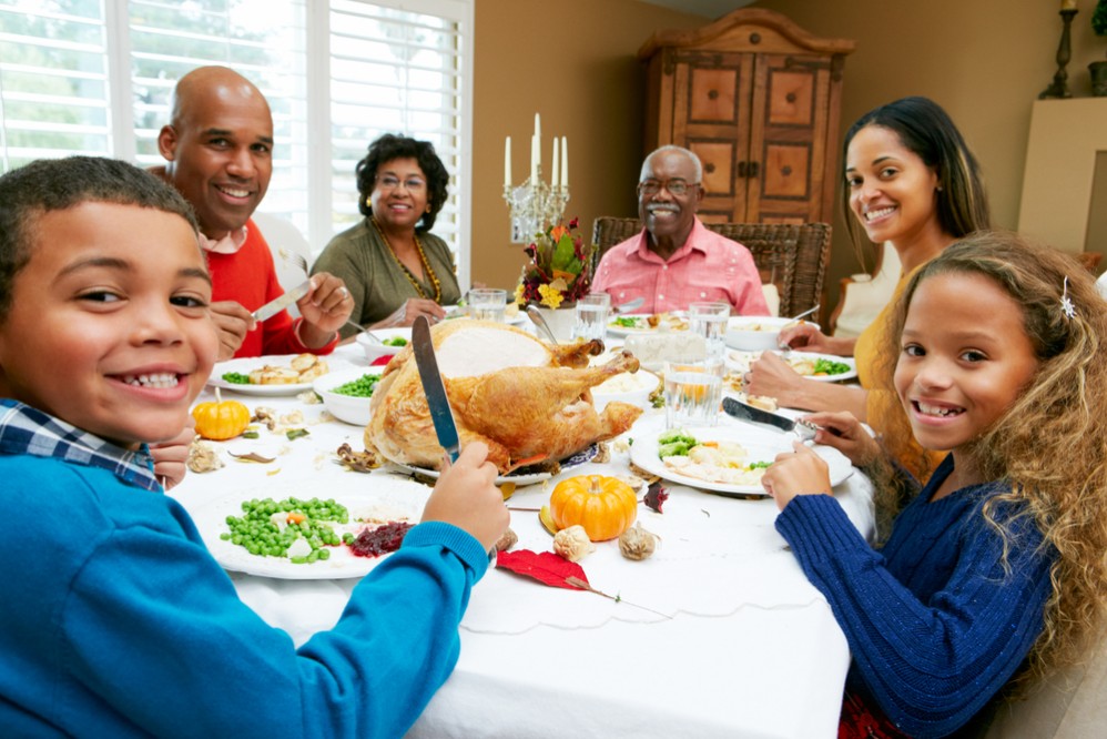 Image result for black family eating at thanksgiving