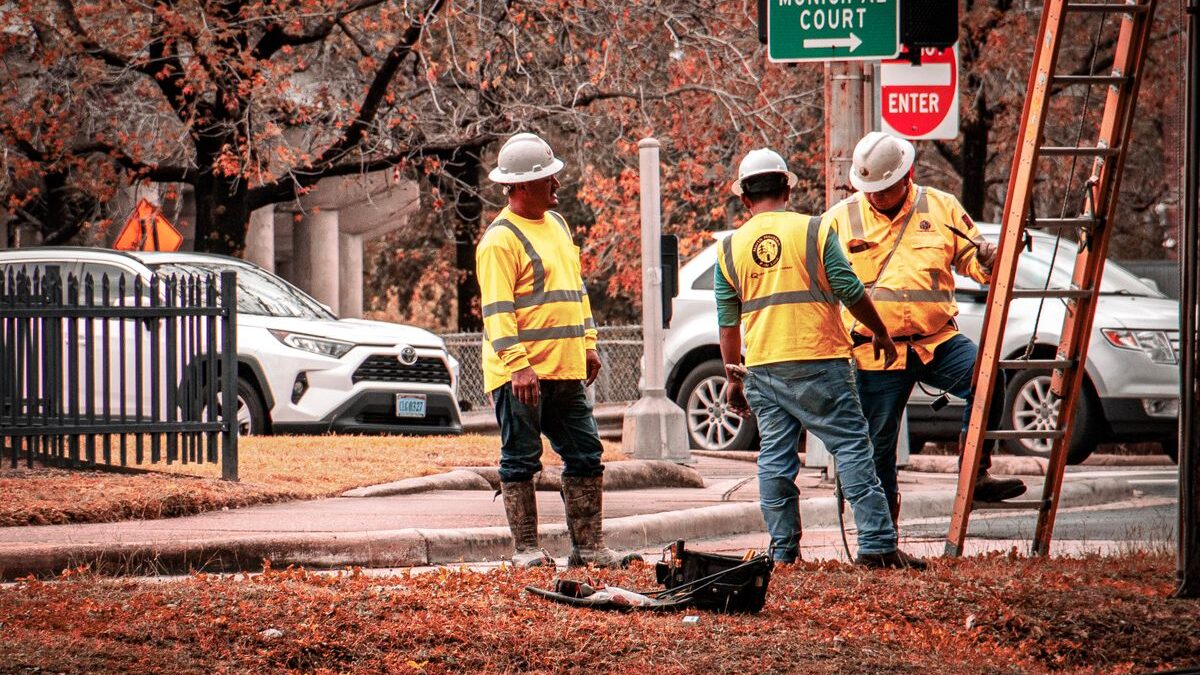 Three construction workers