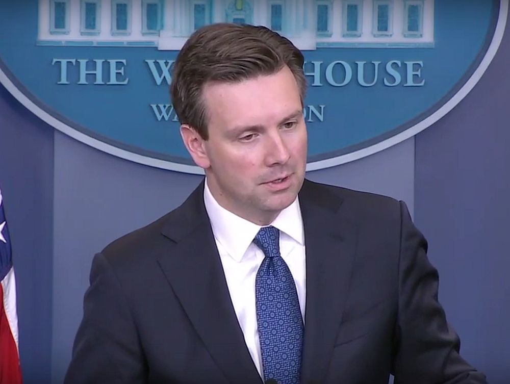 Obama surprises, thanks WH press secretary Josh Earnest during