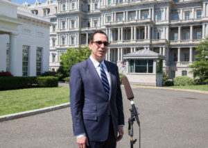 Steven Mnuchin in front of the Eisenhower Executive Building. Ricky Harris, The White House.
