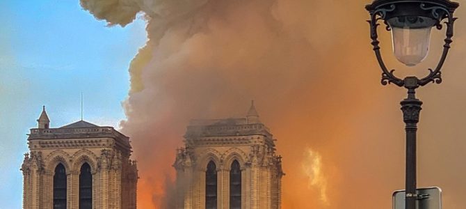 Notre Dame Cathedral on fire. Photo by Milliped, via Shutterstock.