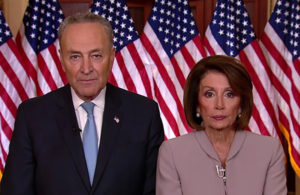 Chuck Schumer and Nancy Pelosi give a joint speech during a government shutdown.