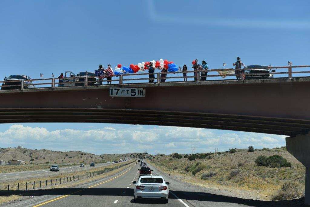 Family greets the convoy as they pass. Courtesy of the Velasquez family.