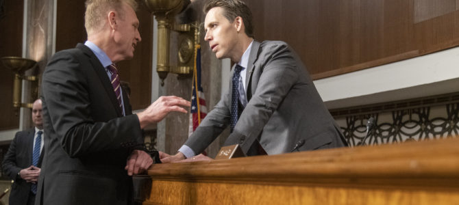 Former Acting Secretary of Defense Patrick Shanahan speaks with Sen. Josh Hawley before the Senate Armed Services Committee in April 2019. DoD/Dominique A. Pineiro/Flickr..