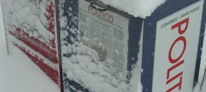 Politico and Washington Times newspaper boxes in the snow in 2010. Samir Luther/Flickr.