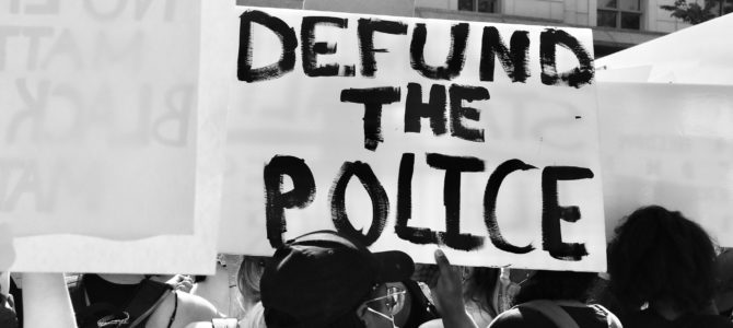 defund the police sign