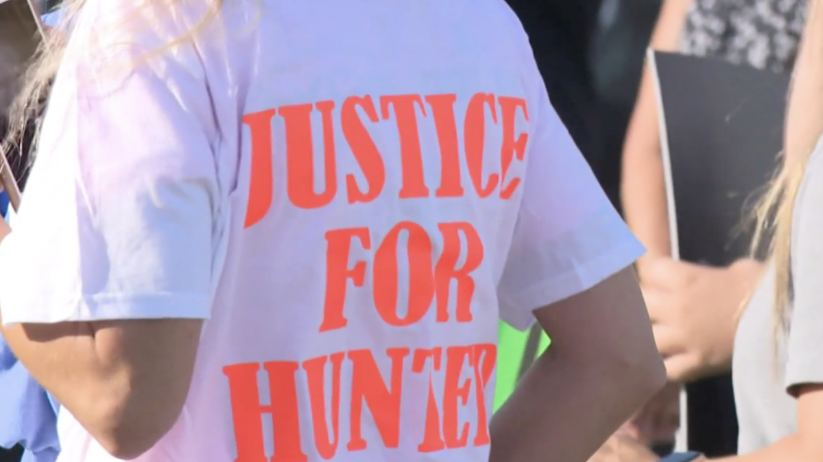 Woman wearing Justice for Hunter shirt