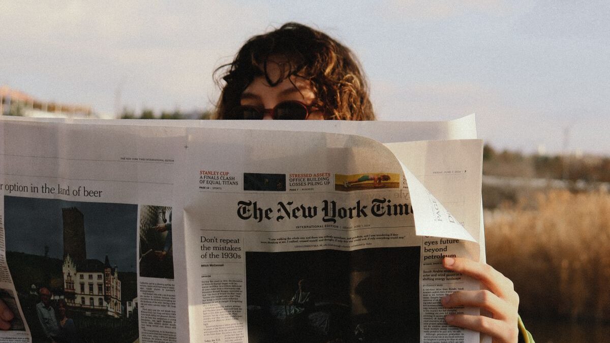 Woman reading The New York Times