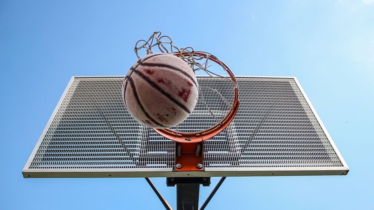 Basketball going through hoop