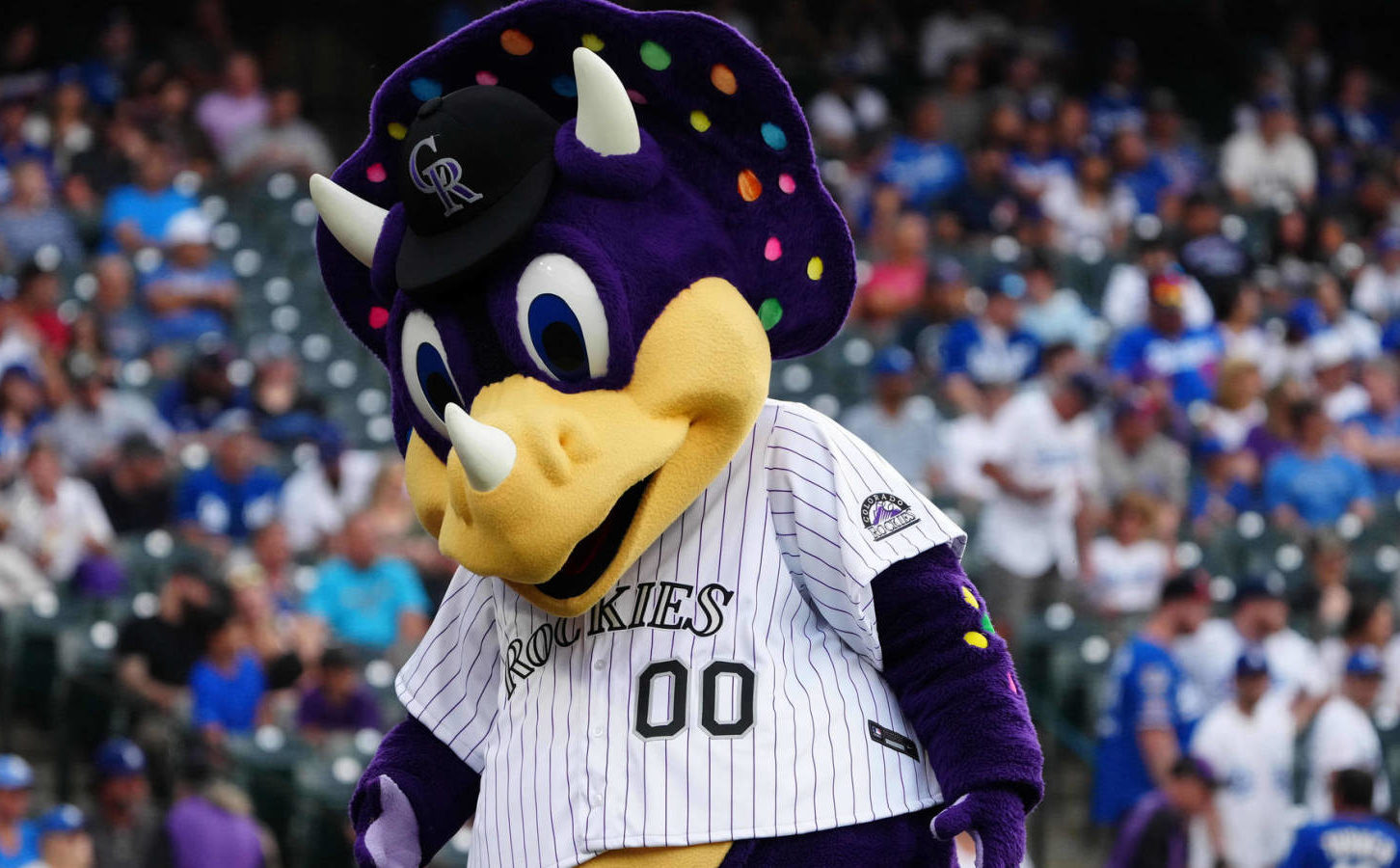 Fan Accused of Shouting Racial Slur Was Actually Just Trying to Get  Attention of Rockies Mascot 'Dinger