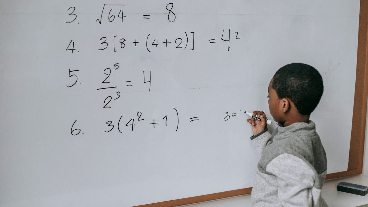 Child doing math in school