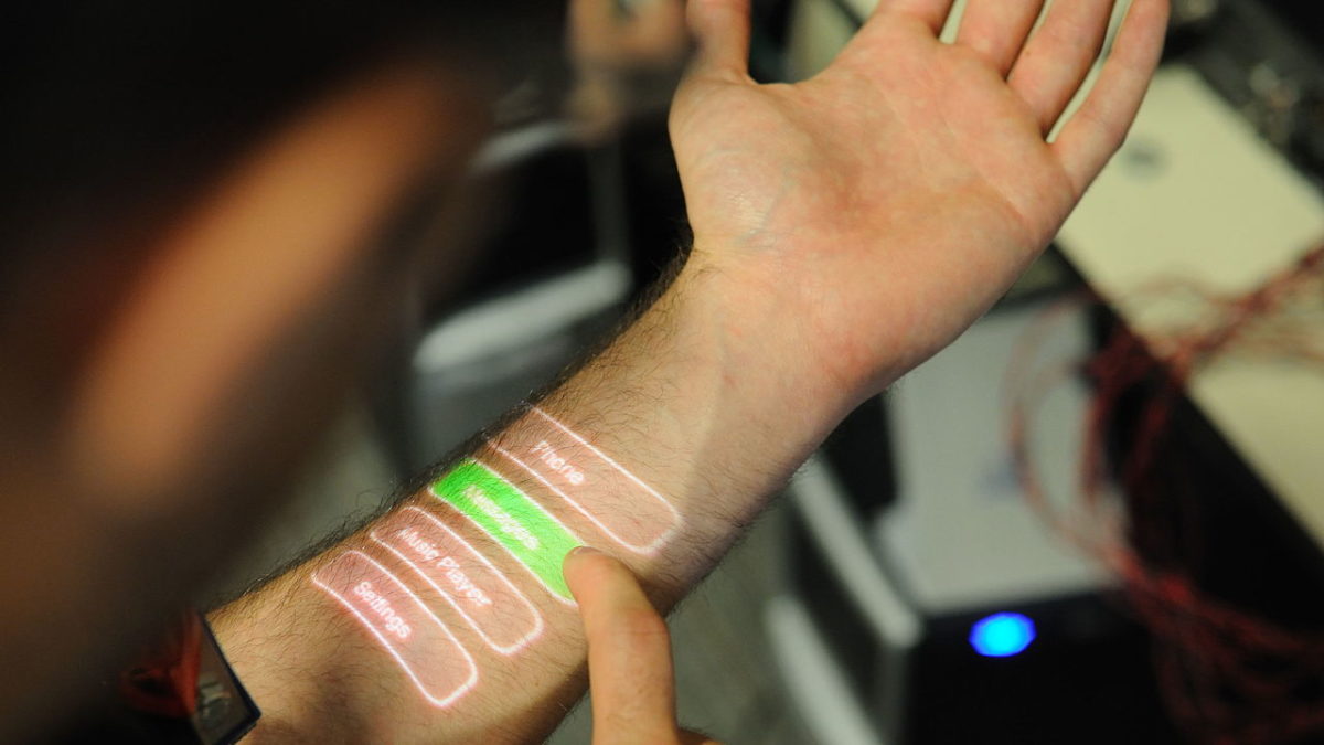 A skinput system projecting tech onto a person's arm