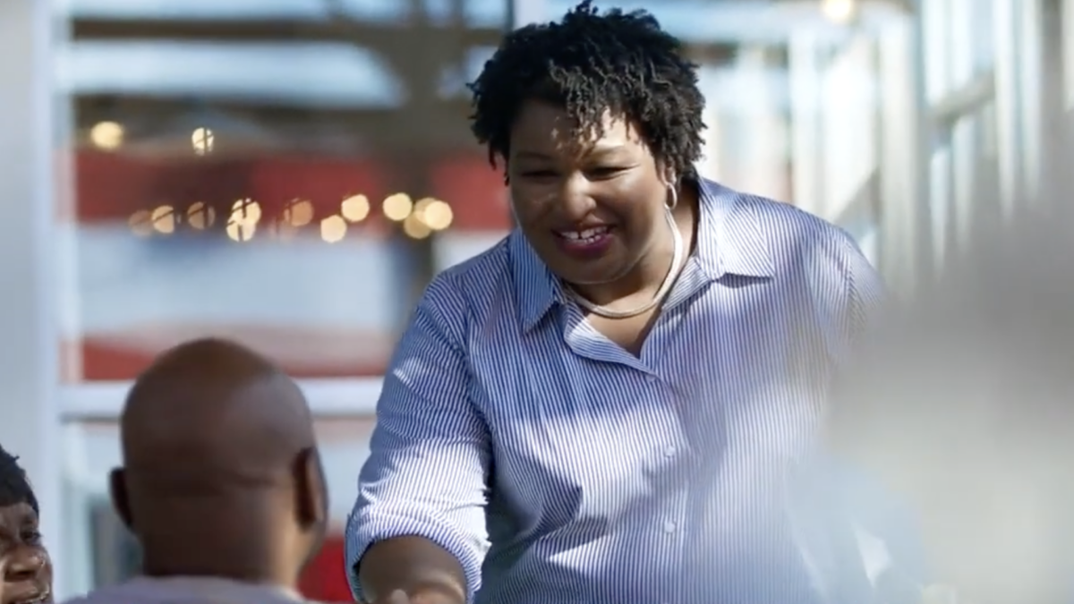 Stacey Abrams shaking hands