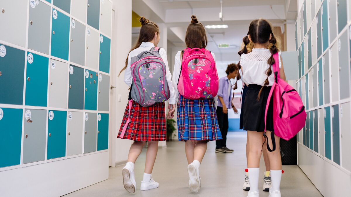 Children with backpacks