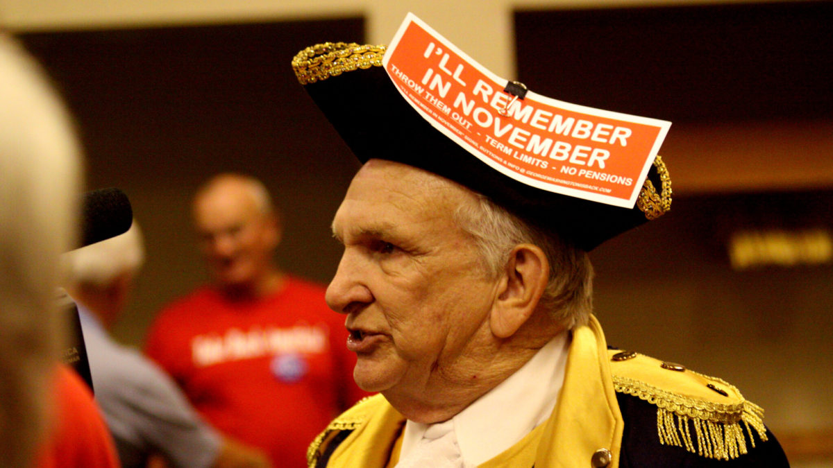 Tea Party protestor wears tri point hat