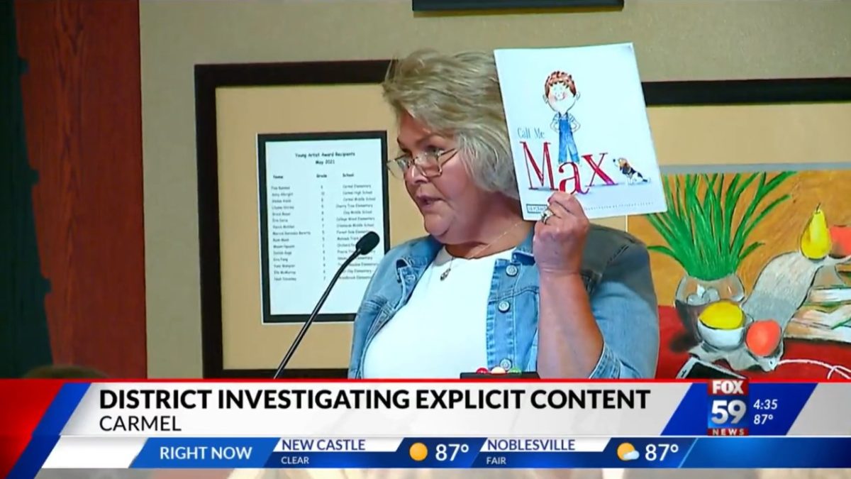 Angry mom in Indiana holds up explicit book