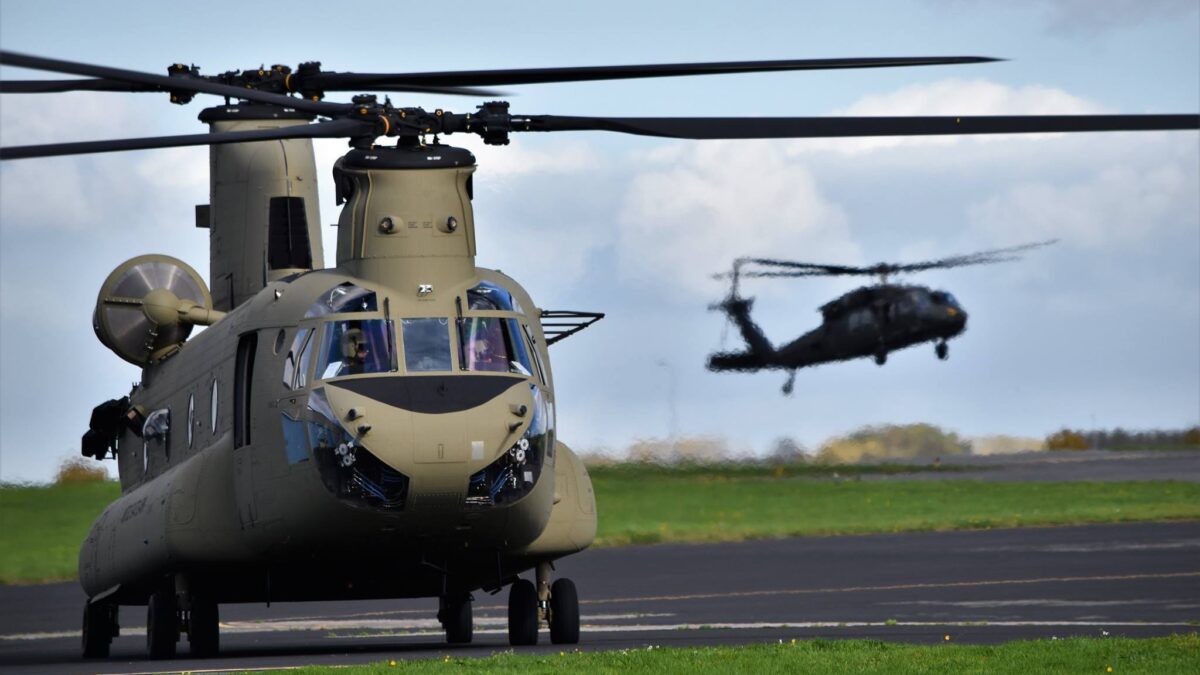 U.S. Army helicopters assigned to the 1st Cavalry Division prepare to depart Chievres Air Base, Belgium for Illesheim, Germany