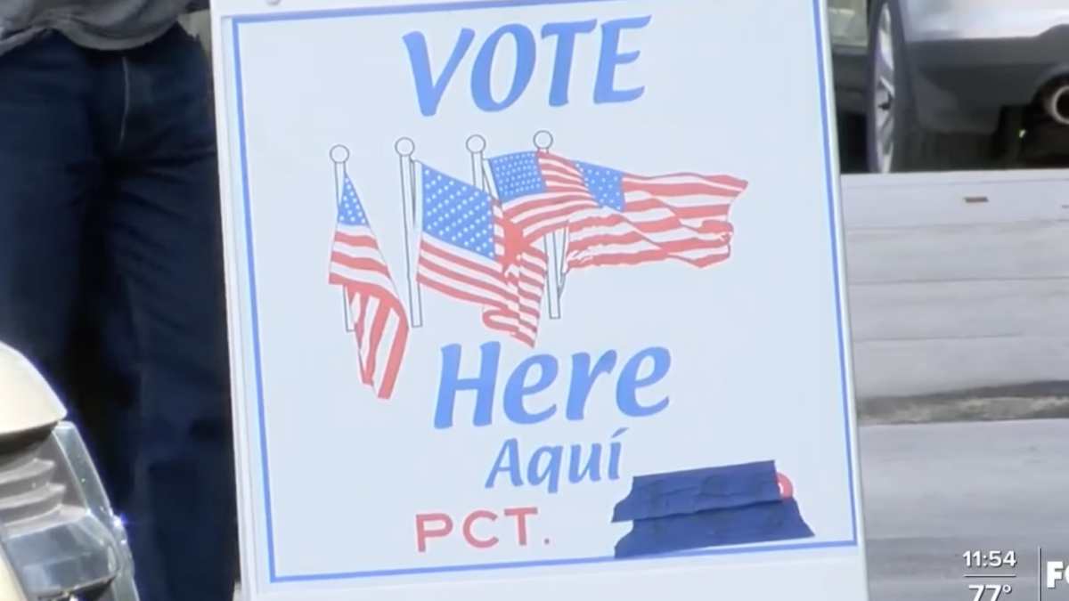 vote here sign in spanish