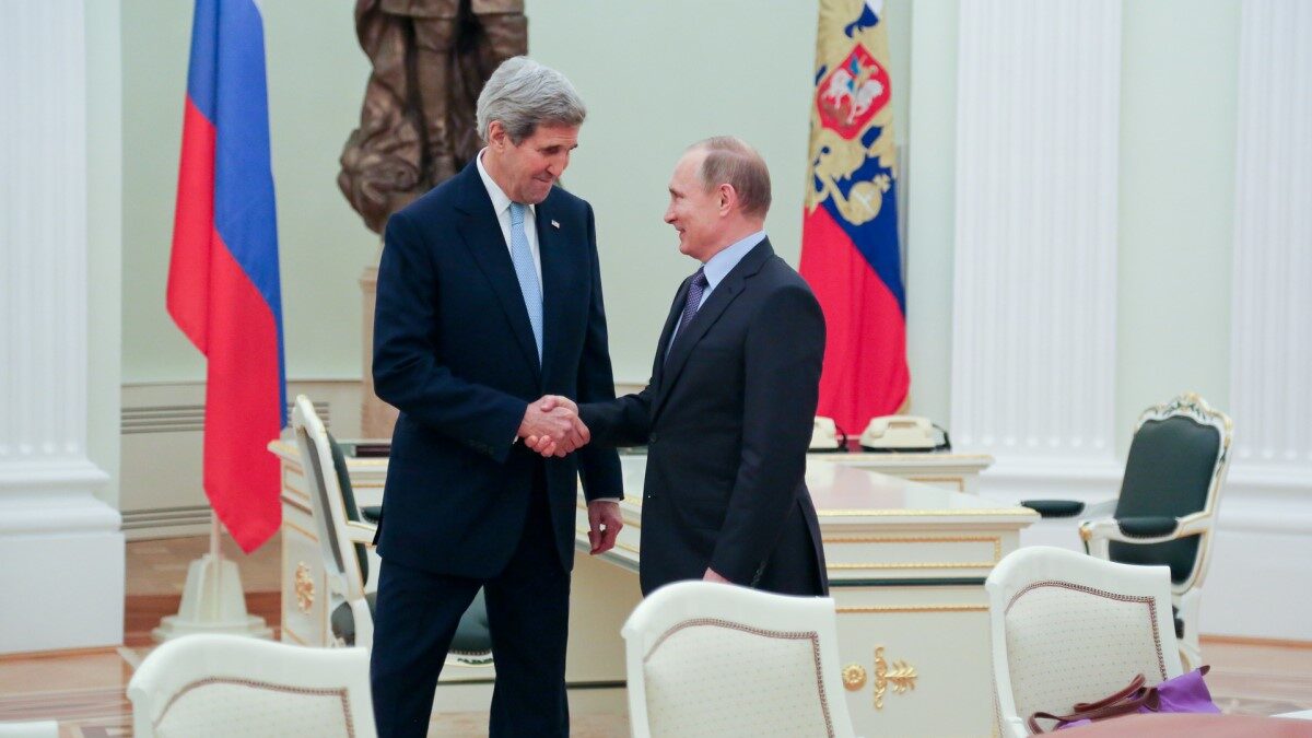 Russian President Putin Greets Secretary Kerry Before Their Meeting at the Kremlin in Moscow