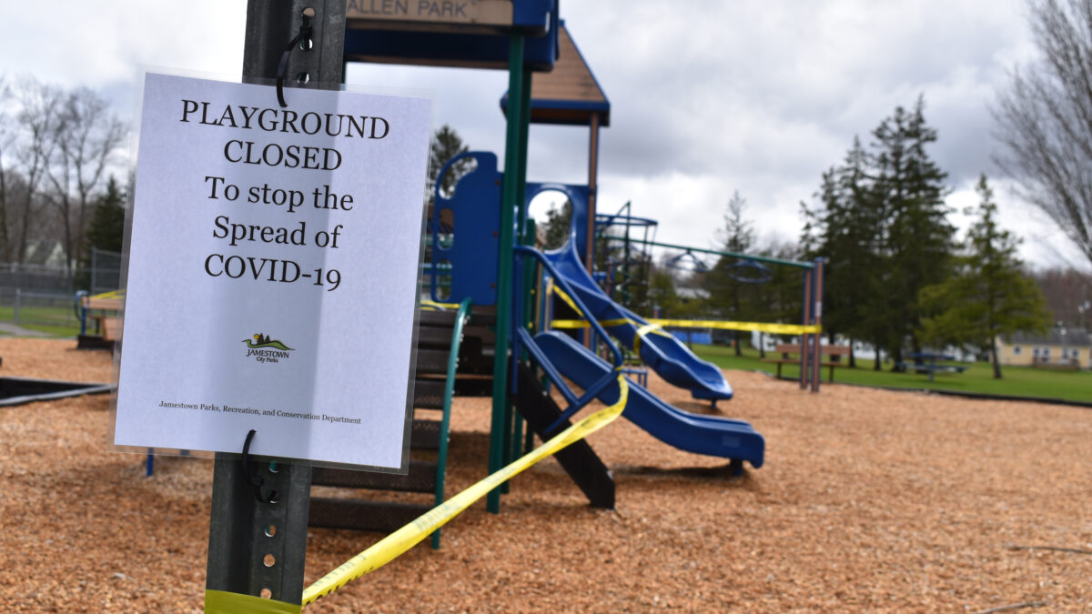 playground roped off with caution tape