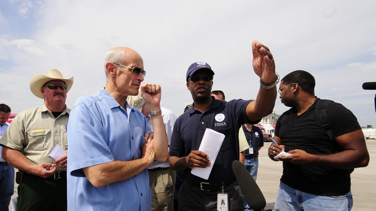 Homeland Security Secretary Michael Chertoff (left) being briefed by Eric Smith (right) FEMA Assistant Administrator for Logistics at the Reliance Center Commodity Staging Site (RSA) in Houston