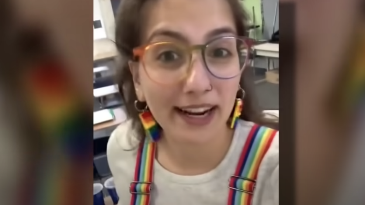 teacher wearing rainbow suspenders