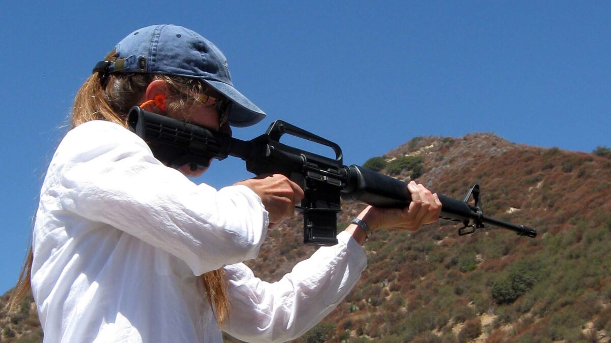 girl shooting rifle