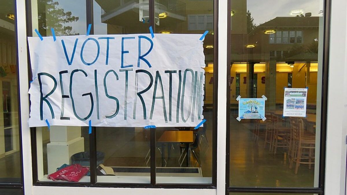 Voter registration sign encouraging people to register to vote