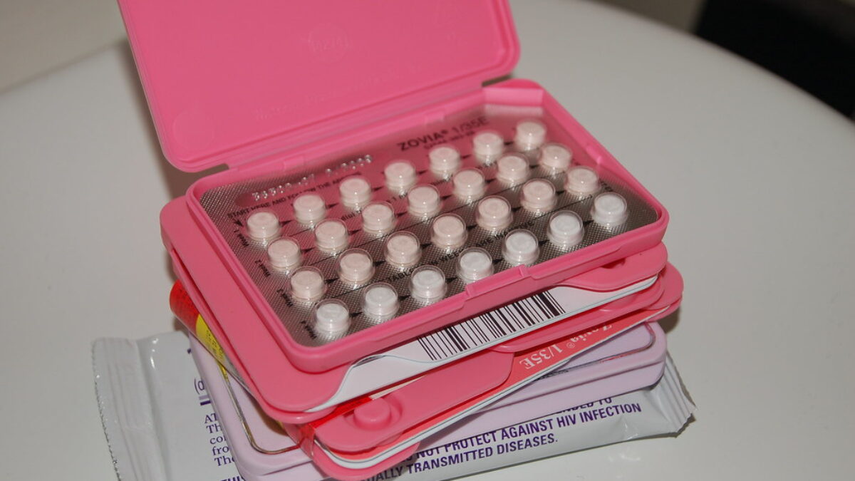 stacks of packs of birth control pills