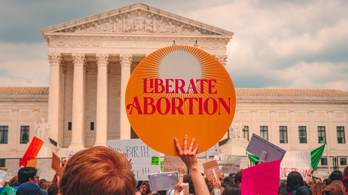 pro-abortion sign held in front of supreme court