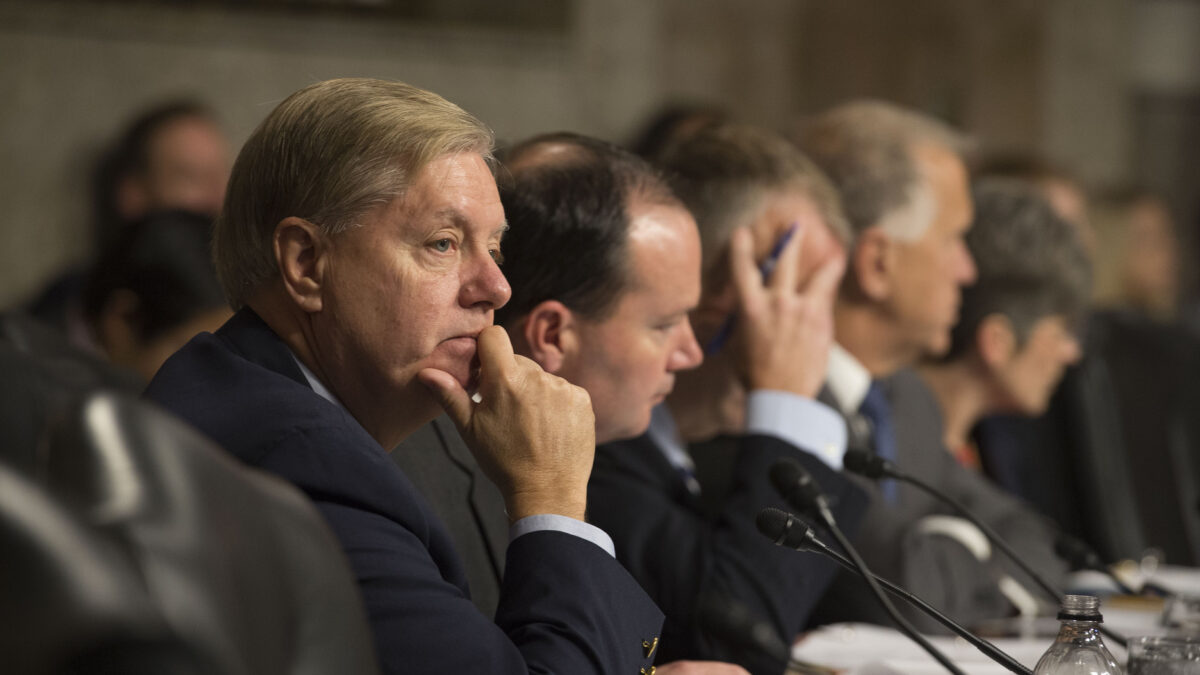 Lindsey Graham and other lawmakers listen to testimony during a hearing