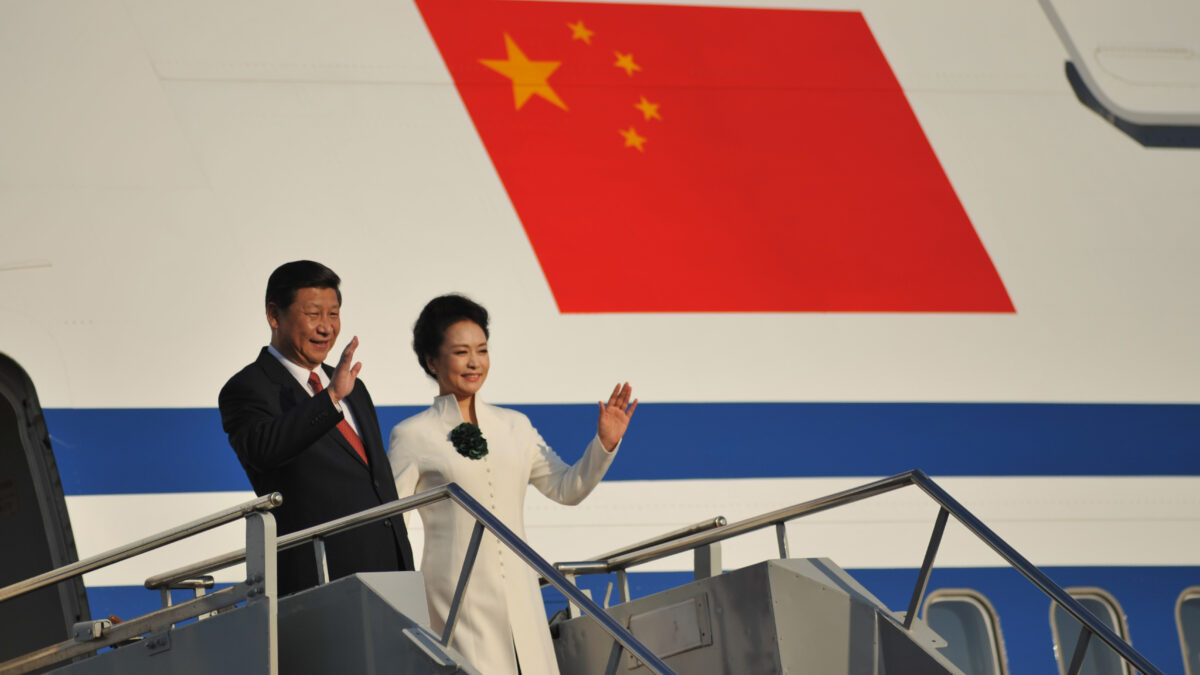 Chinese President Xi Jinping stepping off of an airplane