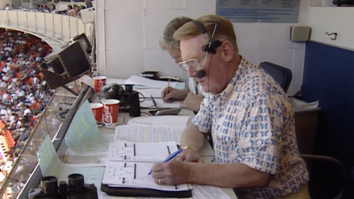 Vin Scully calls game from broadcaster booth