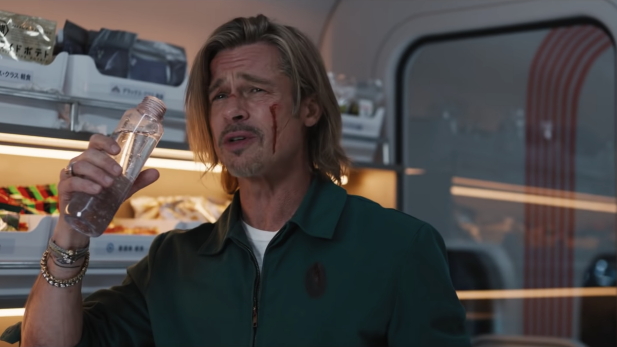 brad pitt with blood on his face drinking a water bottle in Bullet Train