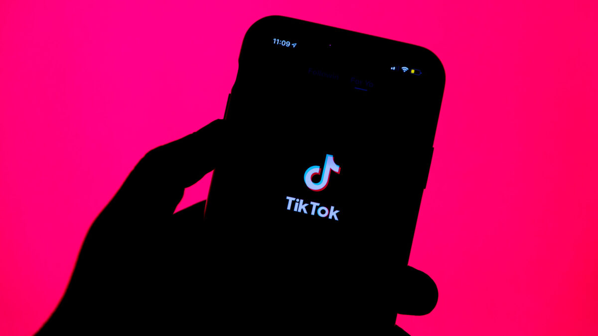 TikTok on a phone in someone's hand