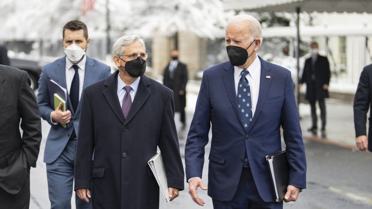 Joe Biden and Merrick Garland walking together