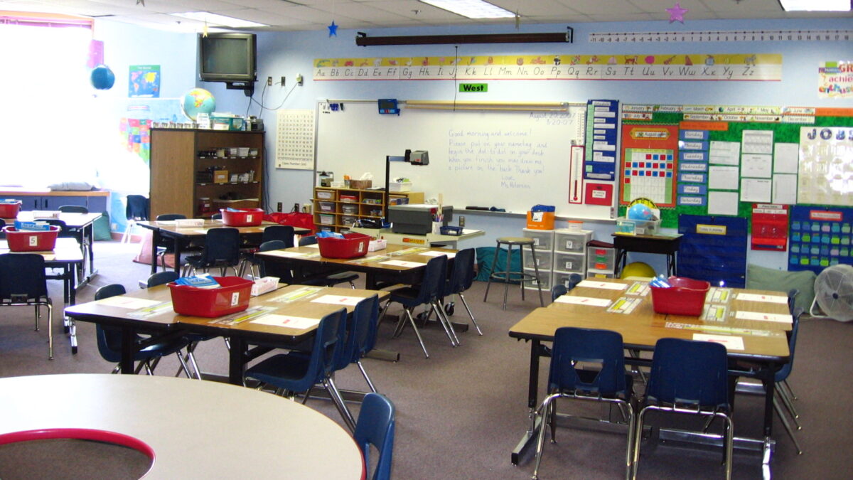empty chairs and desks in elementary classroom