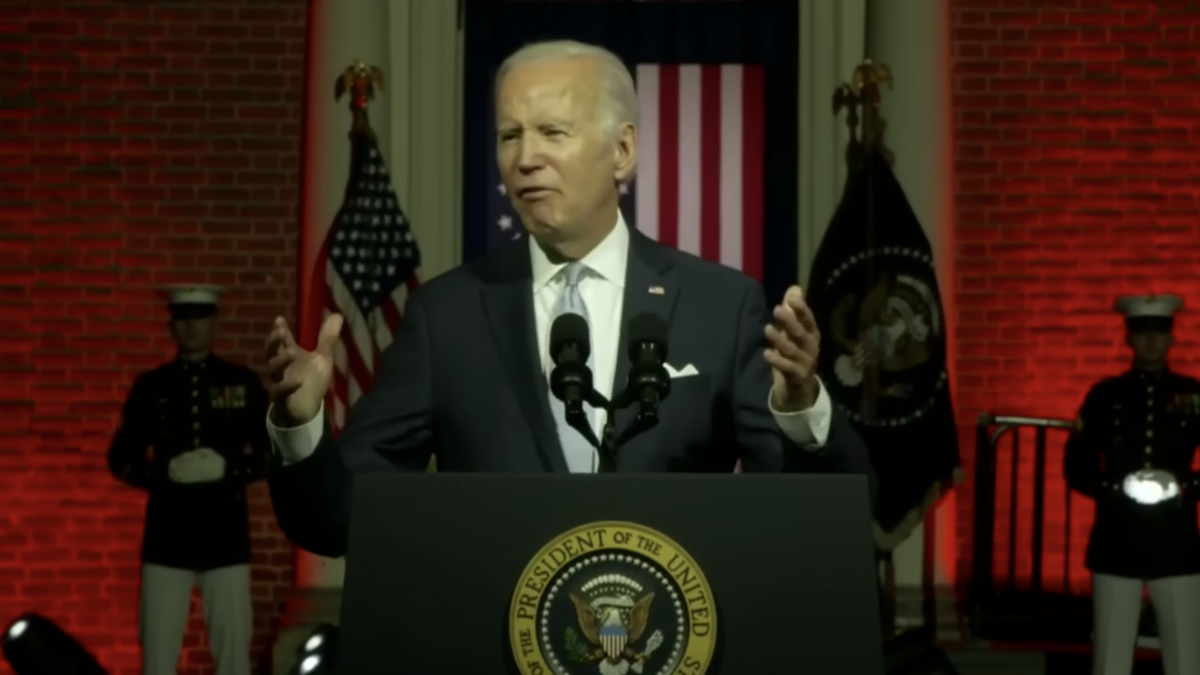 Biden giving speech behind podium