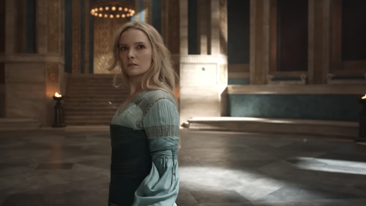 elf queen turns around in blue dress