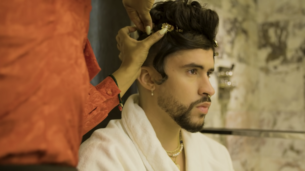 pop star getting his hair bejeweled