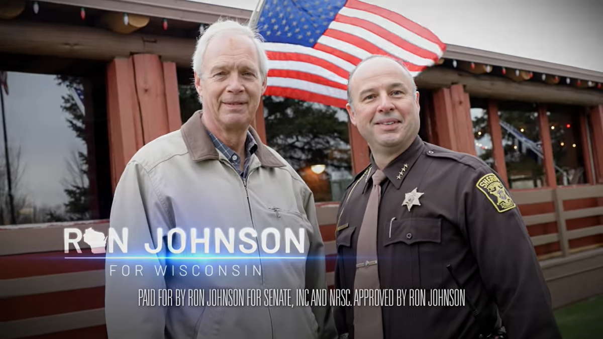 Sen. Ron Johnson with law enforcement officer