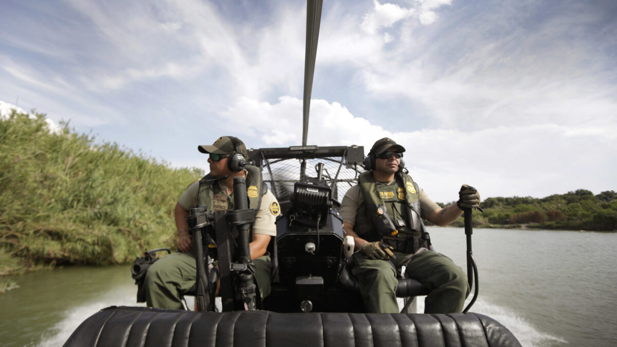 CBP agents patrol on a boat