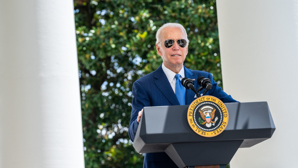 Joe Biden stands behind podium