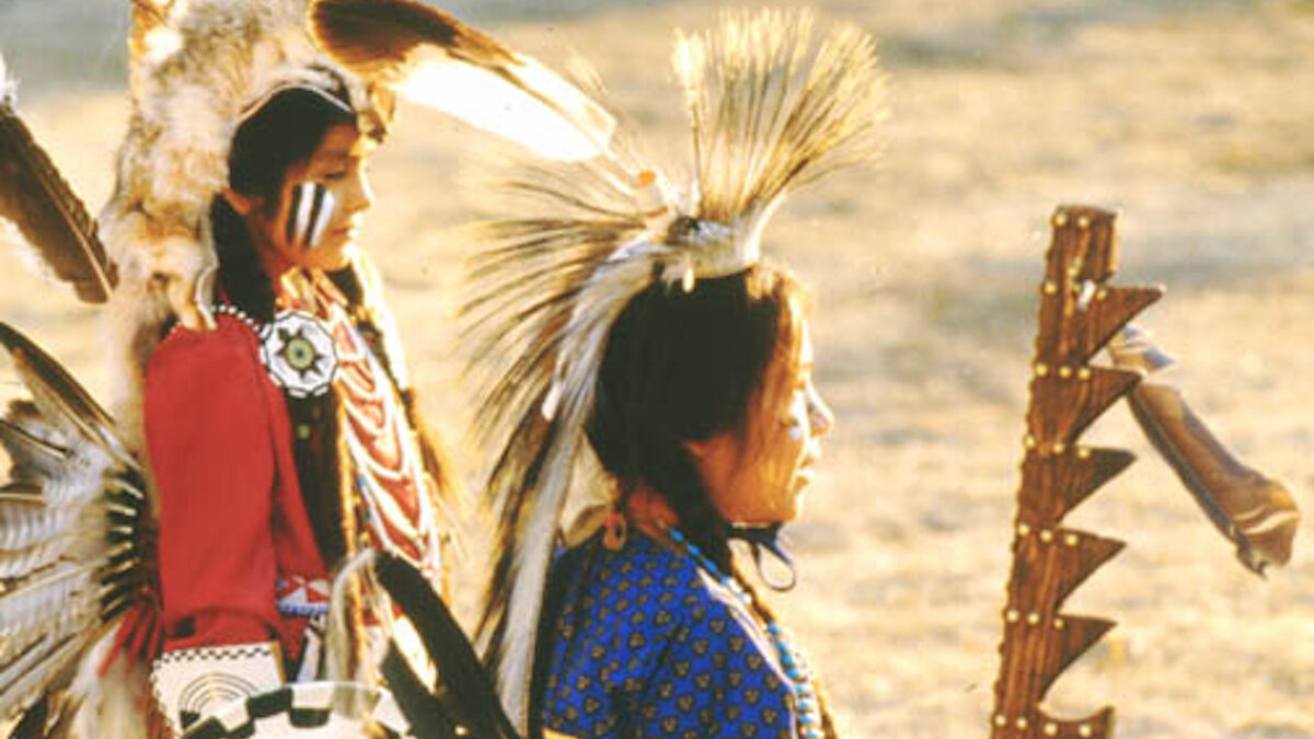 American Indian children wearing traditional dress