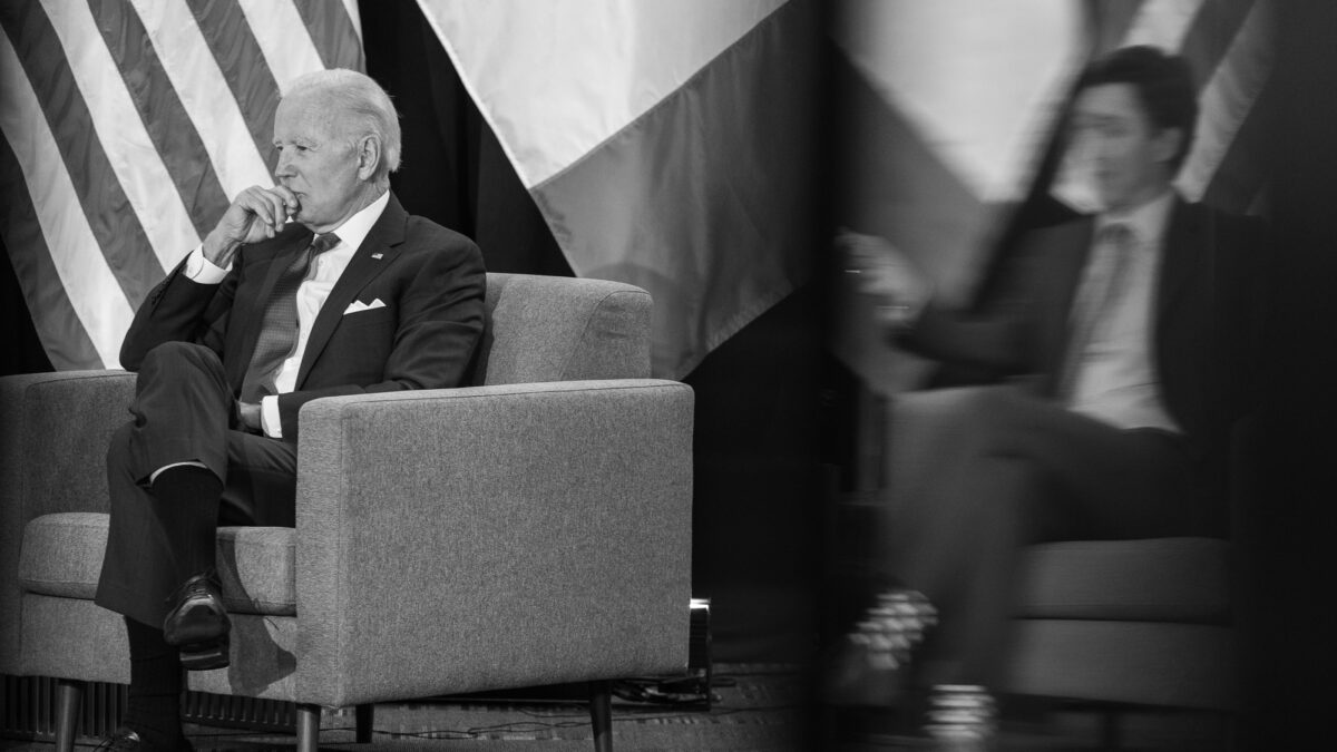 Joe Biden sitting in a chair