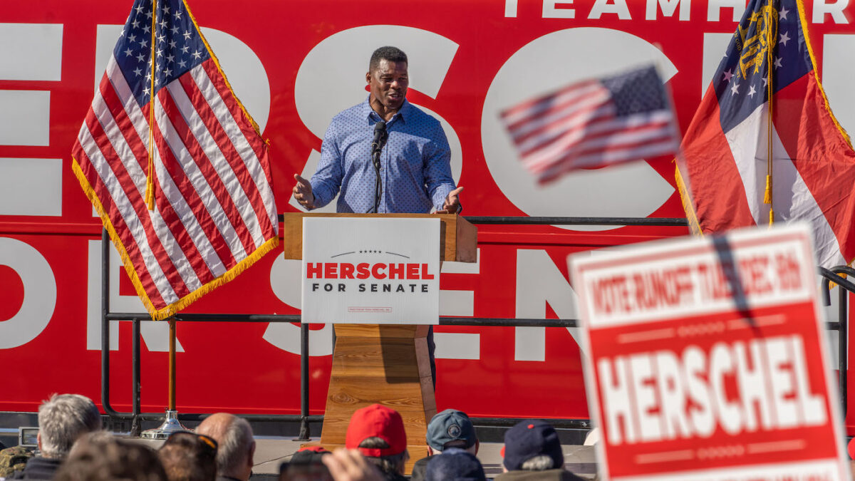 Herschel Walker on a campaign stage