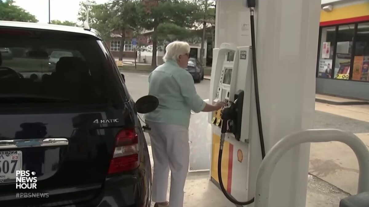 Woman struggling to pay for gas