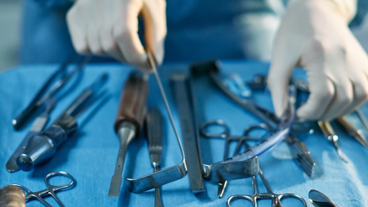 surgeon arranging tools