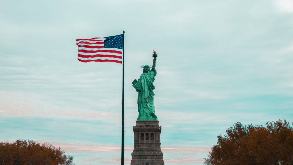 New York scene: Statue of Liberty and American Flag