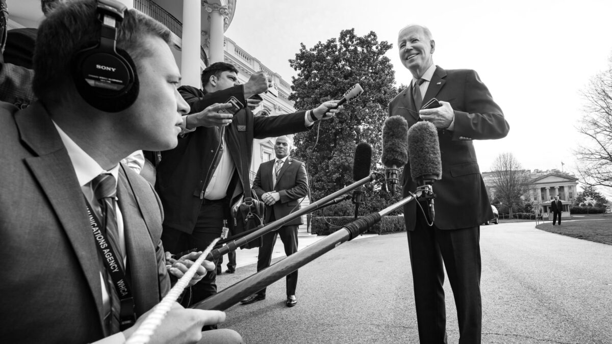 President Joe Biden and reporters